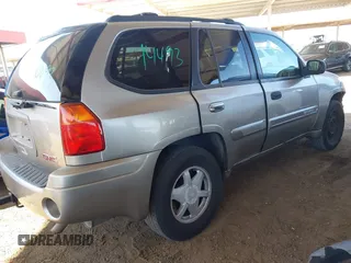 2003 GMC Envoy SLT with VIN 1GKDS13S732346641, listed as a IAAI auction lot 42111222 with 291,231 mi miles and . Bid and sale history available at DreamBid. Image 4.