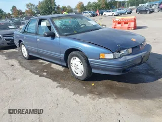 1997 Oldsmobile Cutlass Supreme S z VIN 1G3WH52M3VF338576, wystawiony jako IAAI lot #40573770 z przebiegiem 105 806 mil mil oraz . Historia ofert i sprzedaży dostępna na DreamBid. Obrazek 1.