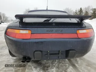 1993 Porsche 928 z VIN WP0AA2929PS815135, wystawiony jako Copart lot #86840514 z przebiegiem 69 263 mil mil oraz Szkody całkowita. Historia ofert i sprzedaży dostępna na DreamBid. Obrazek 6.
