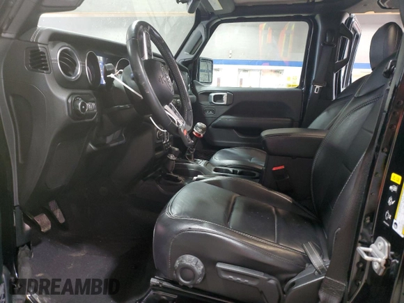 2021 Jeep Wrangler Unlimited Sahara High Altitude with VIN 1C4HJXEG9MW571844, listed as a Copart auction lot 81482334 with 77,409 mi miles and Salvage title. Bid and sale history available at DreamBid. Image 7.