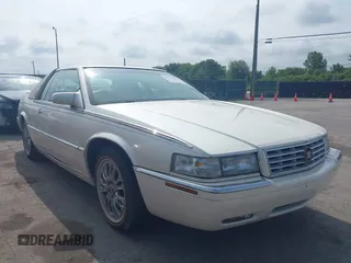 2001 Cadillac Eldorado ESC with VIN 1G6EL12Y01B104230, listed as a IAAI auction lot 42521397 with 60,570 mi miles and . Bid and sale history available at DreamBid. Image 1.