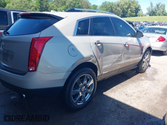 2011 Cadillac SRX Premium Collection with VIN 3GYFNCEY6BS507874, listed as a IAAI auction lot 42320240 with 164,138 mi miles and . Bid and sale history available at DreamBid. Image 4.
