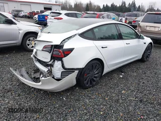 2023 Tesla Model 3 Performance z VIN 5YJ3E1EC9PF545648, wystawiony jako IAAI lot #41573583 z przebiegiem 15 207 mil mil oraz . Historia ofert i sprzedaży dostępna na DreamBid. Obrazek 4.