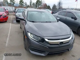2017 Honda Civic LX with VIN 19XFC2F52HE233607, listed as a IAAI auction lot 41758632 with 159,290 mi miles and . Bid and sale history available at DreamBid. Image 12.