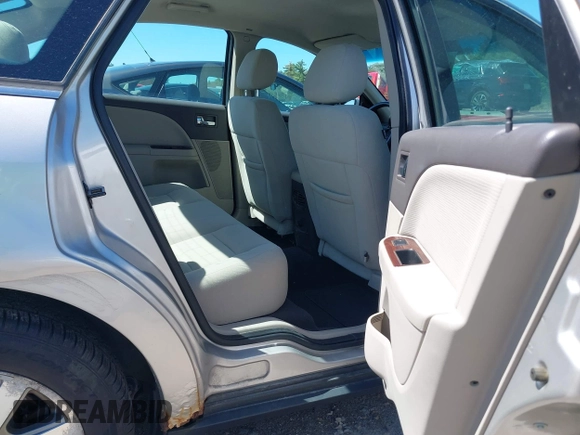 2008 Ford Taurus SEL with VIN 1FAHP24W18G115823, listed as a IAAI auction lot 42119435 with 57,867 mi miles. Bid and sale history available at carsss.com. Image 8.