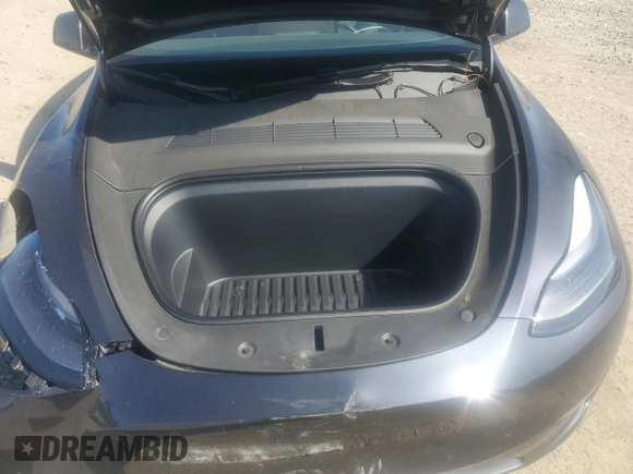 2024 Tesla Model Y с VIN 7SAYGDED2RF100152, выставлен на аукционе Copart как лот 52133535 с пробегом 7 632 миль миль и Списание • Salvage title. История ставок и продаж доступна на DreamBid. Изображение 13.