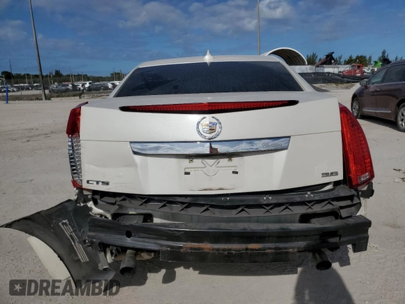 2012 Cadillac CTS Performance with VIN 1G6DJ5E3XC0157881, listed as a Copart auction lot 86434934 with 60,943 mi miles and Salvage Title. Bid and sale history available at DreamBid. Image 6.