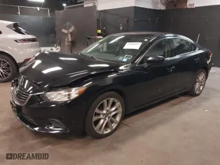 2015 Mazda Mazda6 i Touring with VIN JM1GJ1V64F1177149, listed as a IAAI auction lot 41888297 with 70,777 mi miles. Bid and sale history available at carsss.com. Image 2.