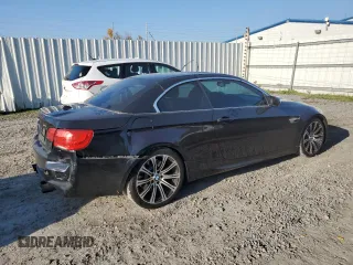 2013 BMW M3 with VIN WBSDX9C58DE785751, listed as a Copart auction lot 77334634 with 77,419 mi miles and Salvage Title. Bid and sale history available at carsss.com. Image 3.