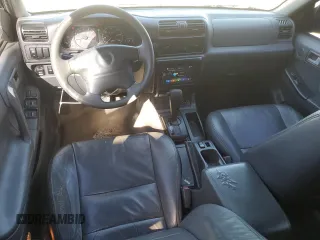 2001 Isuzu Rodeo S with VIN 4S2CK58W514310849, listed as a Copart auction lot 89221945 with 138,720 mi miles and Salvage title. Bid and sale history available at DreamBid. Image 8.