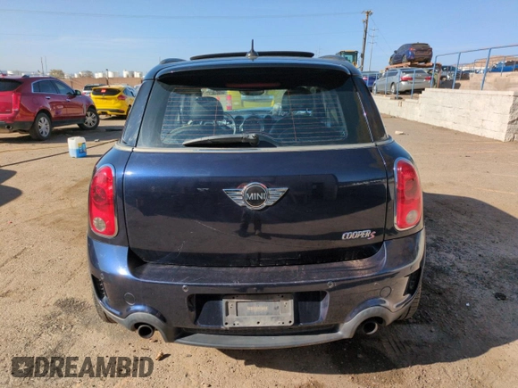 2012 MINI Countryman S with VIN WMWZC5C50CWL63321, listed as a Copart auction lot 52427065 with 126,898 mi miles and Salvage Title. Bid and sale history available at DreamBid. Image 6.