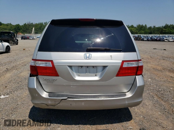 2007 Honda Odyssey LX with VIN 5FNRL38287B054504, listed as a Copart auction lot 59141665 with 128,617 mi miles and Salvage title. Bid and sale history available at DreamBid. Image 6.