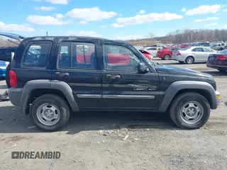 2002 Jeep Liberty Sport with VIN 1J4GL48K82W345855, listed as a IAAI auction lot 41687317 with 231,969 mi miles. Bid and sale history available at carsss.com. Image 14.