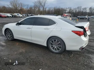 2019 Acura TLX with VIN 19UUB2F31KA001469, listed as a Copart auction lot 82818834 with 64,498 mi miles and Salvage Title. Bid and sale history available at carsss.com. Image 2.