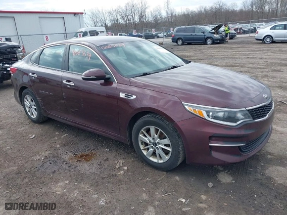 2016 Kia Optima LX with VIN 5XXGT4L36GG108599, listed as a IAAI auction lot 42065639 with 127,387 mi miles. Bid and sale history available at carsss.com. Image 1.