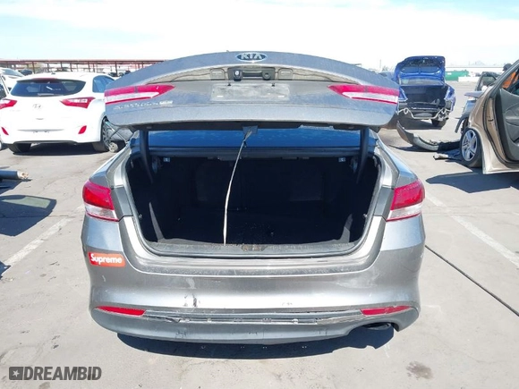 2017 Kia Optima LX with VIN 5XXGT4L30HG149506, listed as a IAAI auction lot 41591864 with 137,087 mi miles. Bid and sale history available at carsss.com. Image 6.