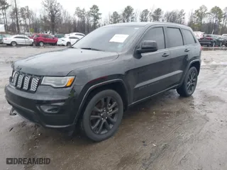 2021 Jeep Grand Cherokee Laredo X with VIN 1C4RJEAG1MC680282, listed as a IAAI auction lot 41466496 with 58,855 mi miles. Bid and sale history available at carsss.com. Image 17.