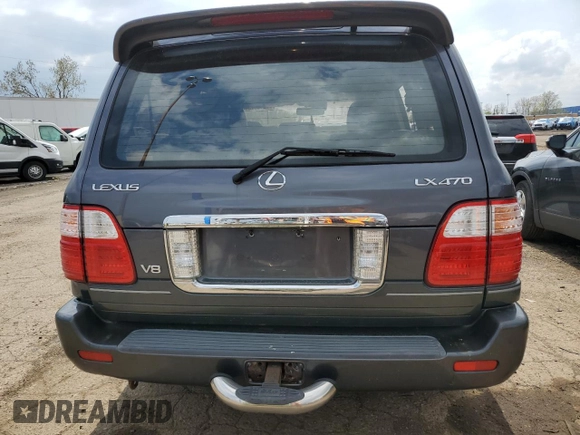 2003 Lexus LX 470 z VIN JTJHT00W733523370, wystawiony jako Copart lot #55516375 z przebiegiem 157 862 mil mil oraz Czysty tytuł • Clean title. Historia ofert i sprzedaży dostępna na DreamBid. Obrazek 6.