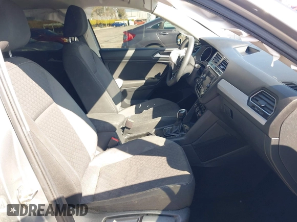 2021 Volkswagen Tiguan S with VIN 3VV1B7AX6MM131036, listed as a IAAI auction lot 41742604 with 55,155 mi miles and . Bid and sale history available at DreamBid. Image 5.