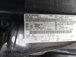 2012 Ford Focus SE with VIN 1FAHP3F24CL381806, listed as a IAAI auction lot 42058773 with Not Provided miles and . Bid and sale history available at DreamBid. Image 9.