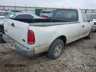 2004 Ford F-150 XL with VIN 2FTRF17244CA64429, listed as a IAAI auction lot 40764716 with 56,997 mi miles and . Bid and sale history available at DreamBid. Image 4.