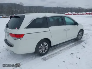 2016 Honda Odyssey EX-L with VIN 5FNRL5H64GB012894, listed as a IAAI auction lot 41256696 with 51,510 mi miles. Bid and sale history available at carsss.com. Image 4.