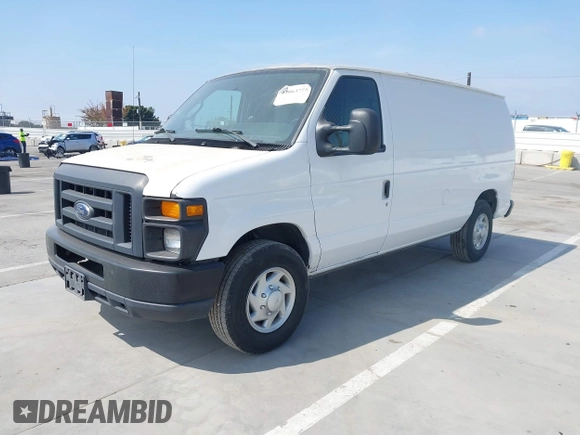 2014 Ford Econoline Cargo Commercial with VIN 1FTNE1EW4EDA90117, listed as a IAAI auction lot 42063775 with 276,021 mi miles and . Bid and sale history available at DreamBid. Image 2.