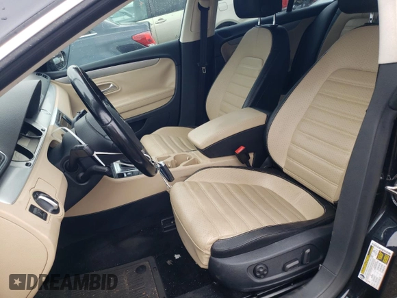 2015 Volkswagen CC R-Line with VIN WVWBP7AN1FE801216, listed as a Copart auction lot 67733404 with 48,394 mi miles and Salvage Title. Bid and sale history available at carsss.com. Image 7.