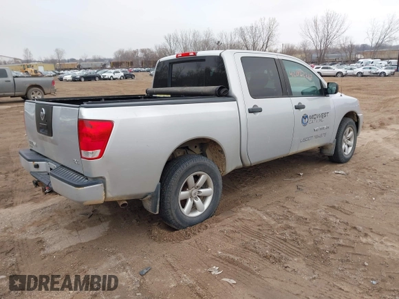 2012 Nissan Titan S with VIN 1N6AA0EJXCN310874, listed as a IAAI auction lot 42022787 with 162,317 mi miles. Bid and sale history available at carsss.com. Image 4.