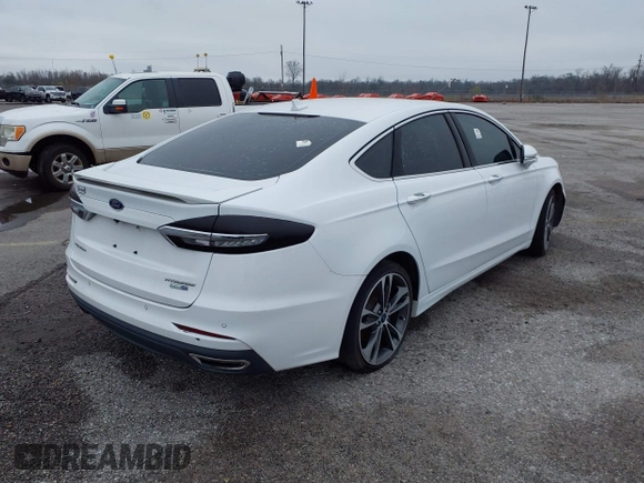 2019 Ford Fusion Titanium with VIN 3FA6P0D9XKR186685, listed as a IAAI auction lot 39181239 with Not provided miles and . Bid and sale history available at DreamBid. Image 4.