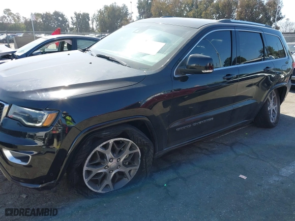 2018 Jeep Grand Cherokee Limited with VIN 1C4RJFBGXJC203561, listed as a IAAI auction lot 41670783 with 69,648 mi miles. Bid and sale history available at carsss.com. Image 6.