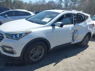 2017 Hyundai Santa Fe 2.4L z VIN 5NMZUDLB9HH028990, wystawiony jako IAAI lot #42055991 z przebiegiem 91 569 mil mil oraz . Historia ofert i sprzedaży dostępna na DreamBid. Obrazek 14.