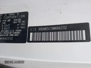 2021 Kia Sedona LX with VIN KNDMB5C19M6662112, listed as a IAAI auction lot 41684140 with 57,874 mi miles. Bid and sale history available at carsss.com. Image 9.