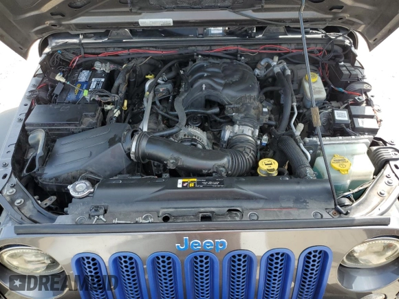2018 Jeep Wrangler JK Unlimited Sport S with VIN 1C4BJWDG3JL899209, listed as a Copart auction lot 67705634 with 100,679 mi miles and Salvage Title. Bid and sale history available at carsss.com. Image 12.