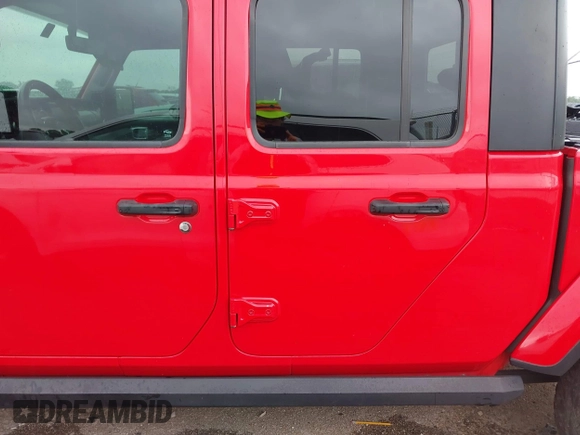 2020 Jeep Gladiator Overland with VIN 1C6HJTFG2LL136758, listed as a IAAI auction lot 42414592 with 57,279 mi miles and . Bid and sale history available at DreamBid. Image 14.