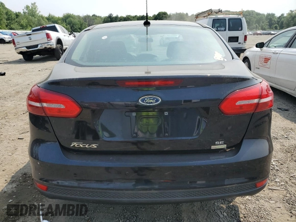 2017 Ford Focus SE with VIN 1FADP3FE7HL280968, listed as a Copart auction lot 60016415 with 90,832 mi miles and Clean title. Bid and sale history available at DreamBid. Image 6.