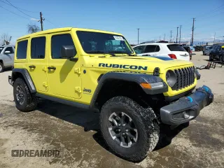 2024 Jeep Wrangler Rubicon z VIN 1C4RJXR64RW193946, wystawiony jako Copart lot #51693105 z przebiegiem 4 863 mil mil oraz Szkoda całkowita • Salvage title. Historia ofert i sprzedaży dostępna na DreamBid. Obrazek 4.