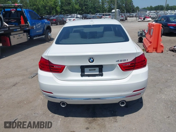 2014 BMW 4 Series 435i with VIN WBA3R1C52EF729201, listed as a IAAI auction lot 42579604 with 145,277 mi miles and . Bid and sale history available at DreamBid. Image 16.