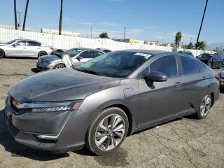 2018 Honda Clarity Plug-In Hybrid with VIN JHMZC5F17JC018537, listed as a Copart auction lot 77413144 with 74,350 mi miles and Salvage Title. Bid and sale history available at carsss.com. Image 1.