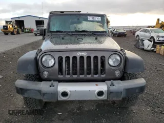 2018 Jeep Wrangler JK Unlimited Sport S with VIN 1C4BJWDG7JL814744, listed as a Copart auction lot 77830714 with 130,229 mi miles and Salvage Title. Bid and sale history available at carsss.com. Image 5.