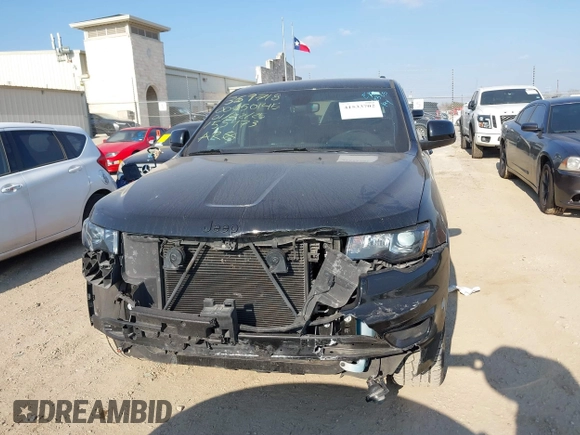 2022 Jeep Grand Cherokee Laredo X with VIN 1C4RJEAG0NC155473, listed as a IAAI auction lot 41533702 with 58,516 mi miles and . Bid and sale history available at DreamBid. Image 12.