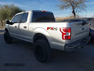 2019 Ford F-150 XL with VIN 1FTEW1E43KKE23264, listed as a IAAI auction lot 41395865 with 106,898 mi miles. Bid and sale history available at carsss.com. Image 3.
