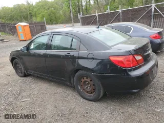 2010 Chrysler Sebring Touring with VIN 1C3CC4FB0AN134875, listed as a Copart auction lot 53635455 with 146,100 mi miles and Salvage Title. Bid and sale history available at carsss.com. Image 2.