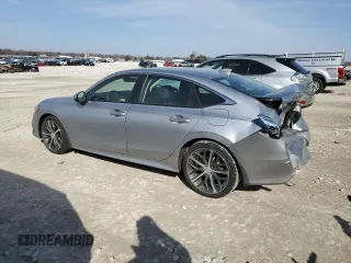 2023 Honda Civic Touring z VIN 2HGFE1F97PH323539, wystawiony jako Copart lot #48790795 z przebiegiem 24 049 mil mil oraz Szkoda całkowita • Salvage title. Historia ofert i sprzedaży dostępna na DreamBid. Obrazek 2.