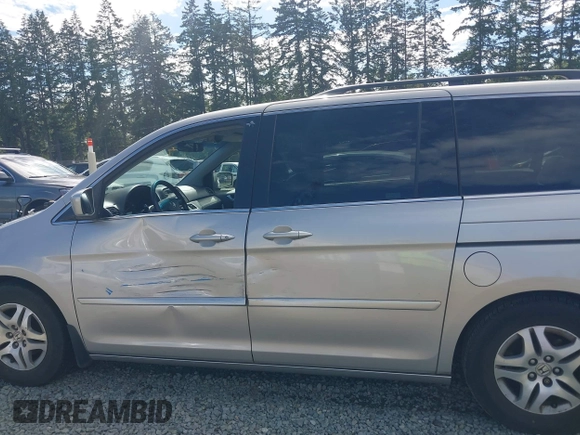 2006 Honda Odyssey EX-L z VIN 5FNRL38726B428227, wystawiony jako IAAI lot #42381464 z przebiegiem 156 623 mil mil oraz . Historia ofert i sprzedaży dostępna na DreamBid. Obrazek 15.