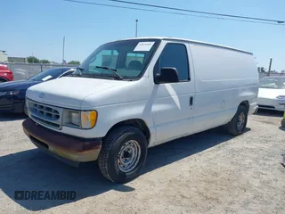 2002 Ford Econoline Cargo with VIN 1FTRE14272HA57164, listed as a IAAI auction lot 42071945 with 236,387 mi miles. Bid and sale history available at carsss.com. Image 2.