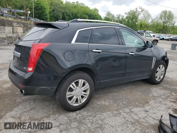 2015 Cadillac SRX Luxury Collection z VIN 3GYFNEE33FS574163, wystawiony jako Copart lot #56667985 z przebiegiem 103 697 mil mil oraz Szkody całkowita. Historia ofert i sprzedaży dostępna na DreamBid. Obrazek 3.