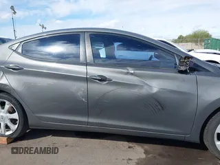 2012 Hyundai Elantra Limited z VIN 5NPDH4AE5CH122064, wystawiony jako IAAI lot #41747692 z przebiegiem 167 479 mil mil oraz . Historia ofert i sprzedaży dostępna na DreamBid. Obrazek 13.