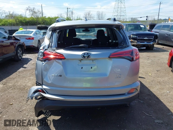 2017 Toyota RAV4 LE with VIN 2T3BFREVXHW546618, listed as a IAAI auction lot 42015842 with 116,888 mi miles and . Bid and sale history available at carsss.com. Image 16.