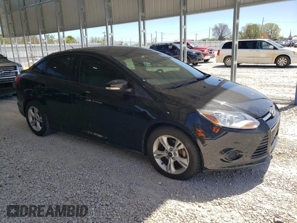 2014 Ford Focus SE with VIN 1FADP3F25EL460855, listed as a Copart auction lot 52911945 with 140,181 mi miles and Salvage Title. Bid and sale history available at DreamBid. Image 4.